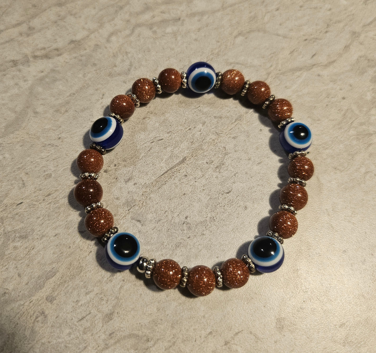 6" Goldstone Evil Eye Bracelet
